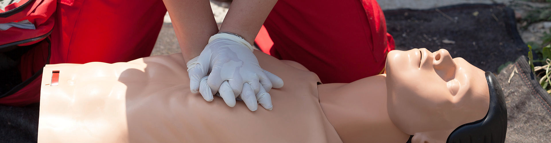 CPR being performed on a medical-training