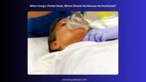 When Using a Pocket Mask, Where Should the Rescuer Be Positioned?