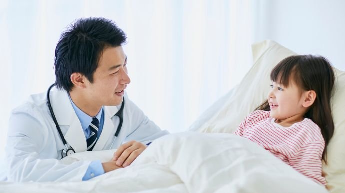 doctor with pediatric patient